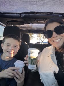 Photo of Jamie McNinch and son getting starbucks